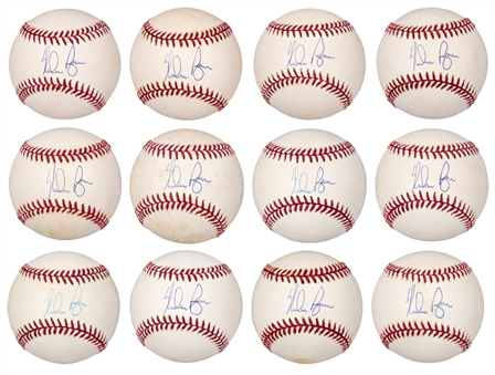Lot of (12) Nolan Ryan Single Signed OAL Brown Baseball (JSA)